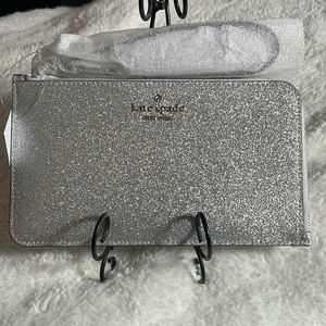 Brand new Kate Spade silver glitter wristlet